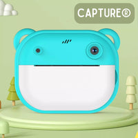 Capture® Cámara Instantánea + 2 Rollos Gratis